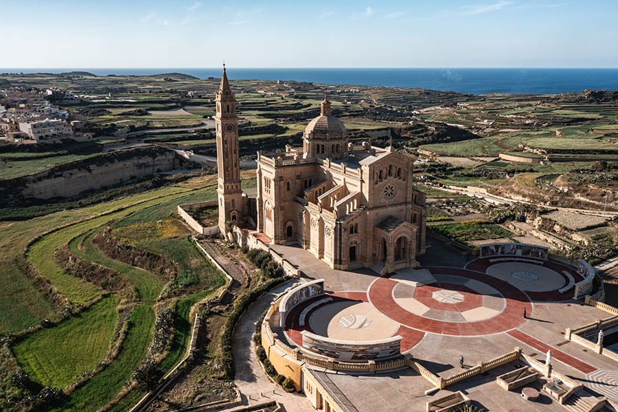 Climbing the Way of the Cross opposite the Ta' Pinu pilgrimage church rewards you with a breathtaking view from the top.